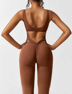 Rugvrije jumpsuit met uitlopende broekspijpen