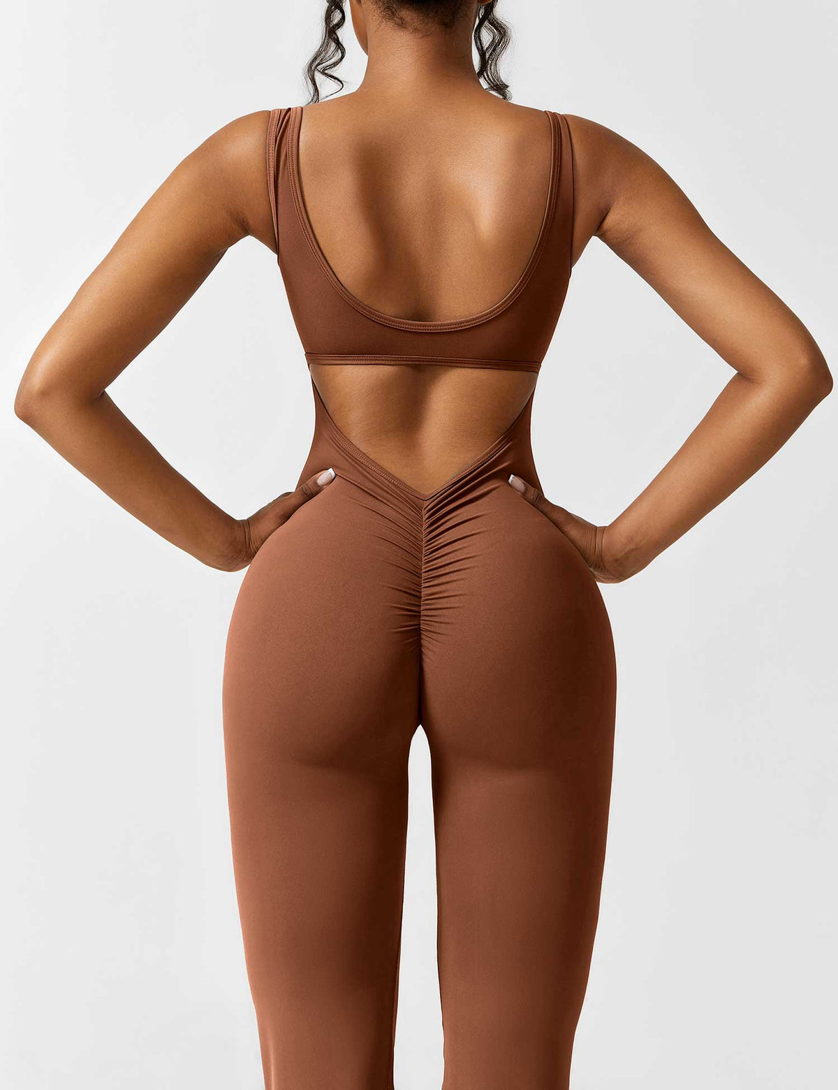 Rugvrije jumpsuit met uitlopende broekspijpen