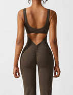 Rugvrije jumpsuit met uitlopende broekspijpen