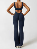 Rugvrije jumpsuit met uitlopende broekspijpen