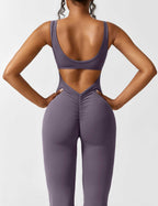 Rugvrije jumpsuit met uitlopende broekspijpen