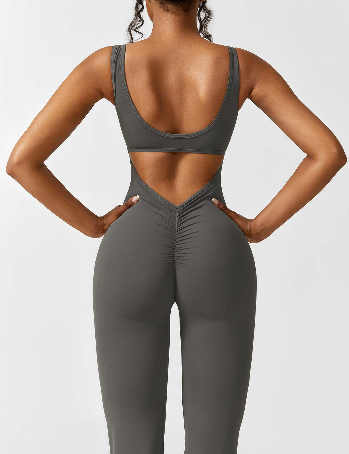 Rugvrije jumpsuit met uitlopende broekspijpen
