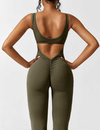 Rugvrije jumpsuit met uitlopende broekspijpen