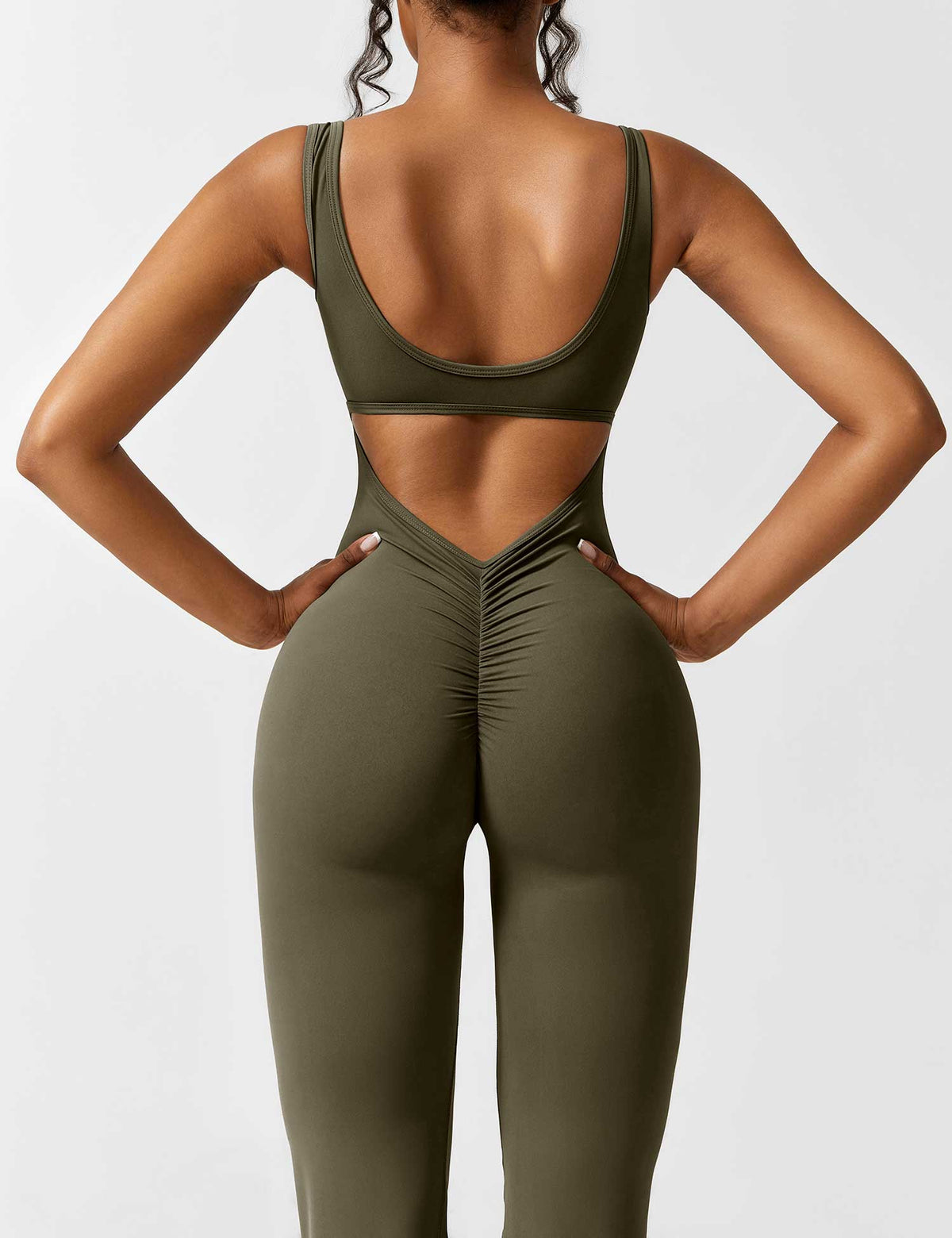 Rugvrije jumpsuit met uitlopende broekspijpen