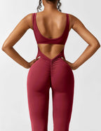 Rugvrije jumpsuit met uitlopende broekspijpen